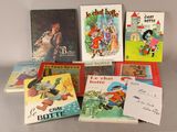 plusieurs livres pour enfants sont alignés sur une table