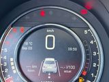 a close up of a car ' s dashboard with a speedometer
