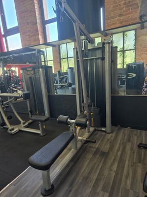 an image of a gym room with equipment in it