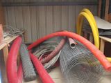 a pile of hoses that are sitting on the floor