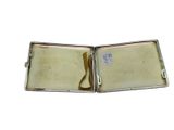 an image of a silver case with a piece of paper inside of it