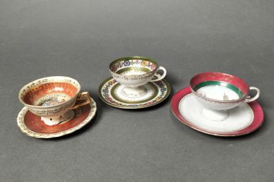 three different types of tea cups and saucers are sitting on a table