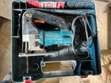 a blue tool box with tools inside of it