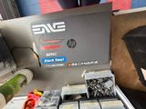 a box of screws and other tools on a table