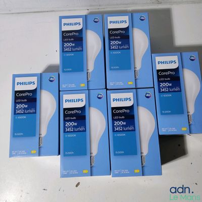 six boxes of philips led light bulbs sitting on top of a table