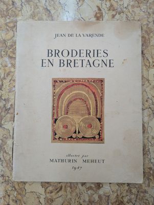 the cover of the book broderies en bretage by jean de la vagonde