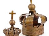 pair of gold crowns with crosses on top of them on a white background