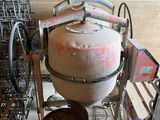 an image of a large cement mixer in a room