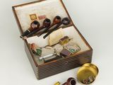 a small box with a lot of items inside of it