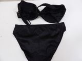 the bottom of a black bikini with a matching bra and matching panties