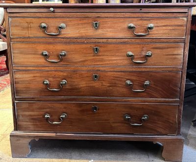 a wooden chest of drawers with many drawers on top of it