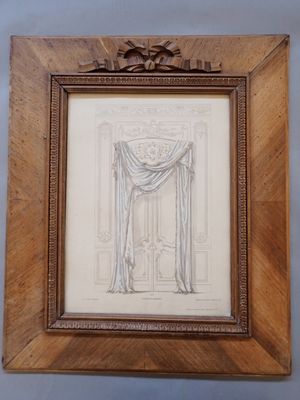 tableau encadré représentant un dessin de bateau dans un cadre en bois