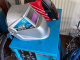 a blue table with a helmet on top of it