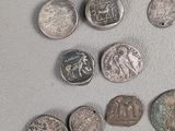 a lot of coins that are sitting on a table