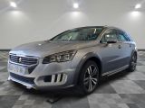 a picture of a silver car in a showroom