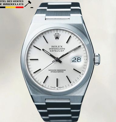 une photo d'une montre Rolex à cadran blanc montée sur un bracelet