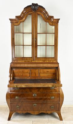 an image of a wooden dresser with a mirror on top of it