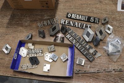 a box of assorted metal items sitting on a table