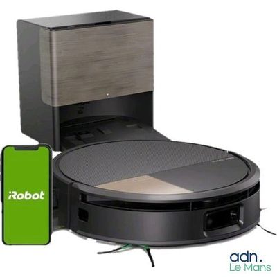 une image d'un aspirateur robotisé avec un téléphone à côté