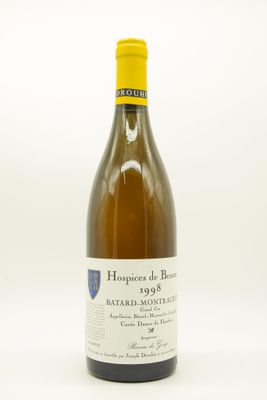 a bottle of wine that is sitting on a table
