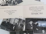several old black and white photos of men in suits and ties