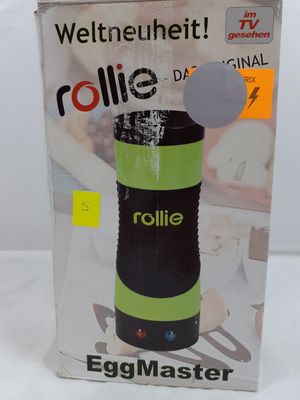 une boîte contenant un Rollie, posée sur une table