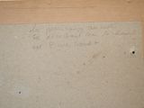 a message written on a piece of cardboard on the wall