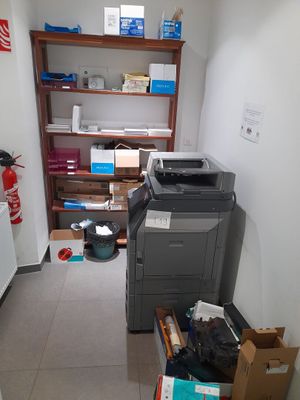 an image of a room with a printer and other things in it