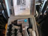 a box with tools in it sitting on a table