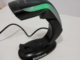 a close up of a computer mouse on a stand