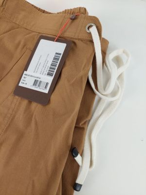 a close up of a pair of brown pants with a tag on it