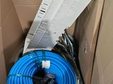 a box with a blue hose and a blue hose in it