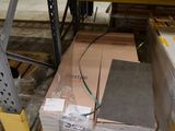 a large stack of boxes sitting on a pallet in a warehouse