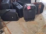 many pieces of luggage sitting on the floor in the garage