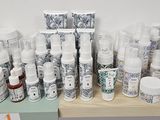 many different types of skin care products displayed on a shelf