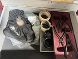 a box with tools and a bag in it