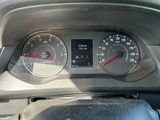 a close up of a car dashboard with a speedometer and gauges