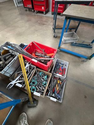 a lot of tools that are sitting on the floor