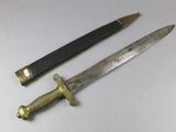 two different types of knives on a white surface