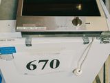 un réchaud posé sur une boîte