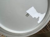 a lot of plates that are sitting on a table