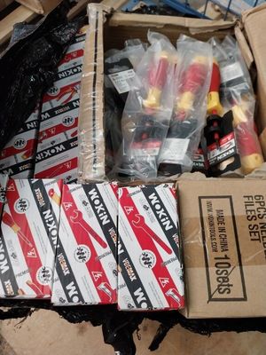 a box full of assorted items sitting on the floor