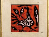 tableau représentant un oiseau sur une branche feuillue, dans un cadre doré
