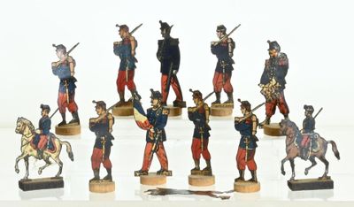 a lot of figurines of soldiers that are on display