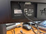an image of a computer monitor with a cable connected to it