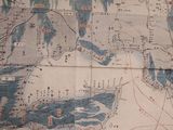 a map of the world on the wall of a building