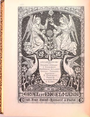 un vieux livre sur lequel figurent des anges et un oiseau