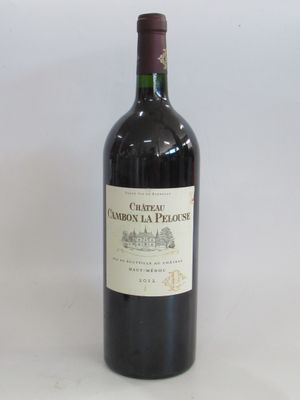 a bottle of wine that is sitting on a table