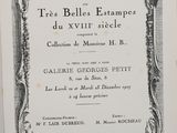 a black and white image of a book with an ornate frame