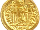 an image of a gold coin with an image of a man holding a sword